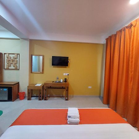 Dolphin Hotel Танга Екстериор снимка