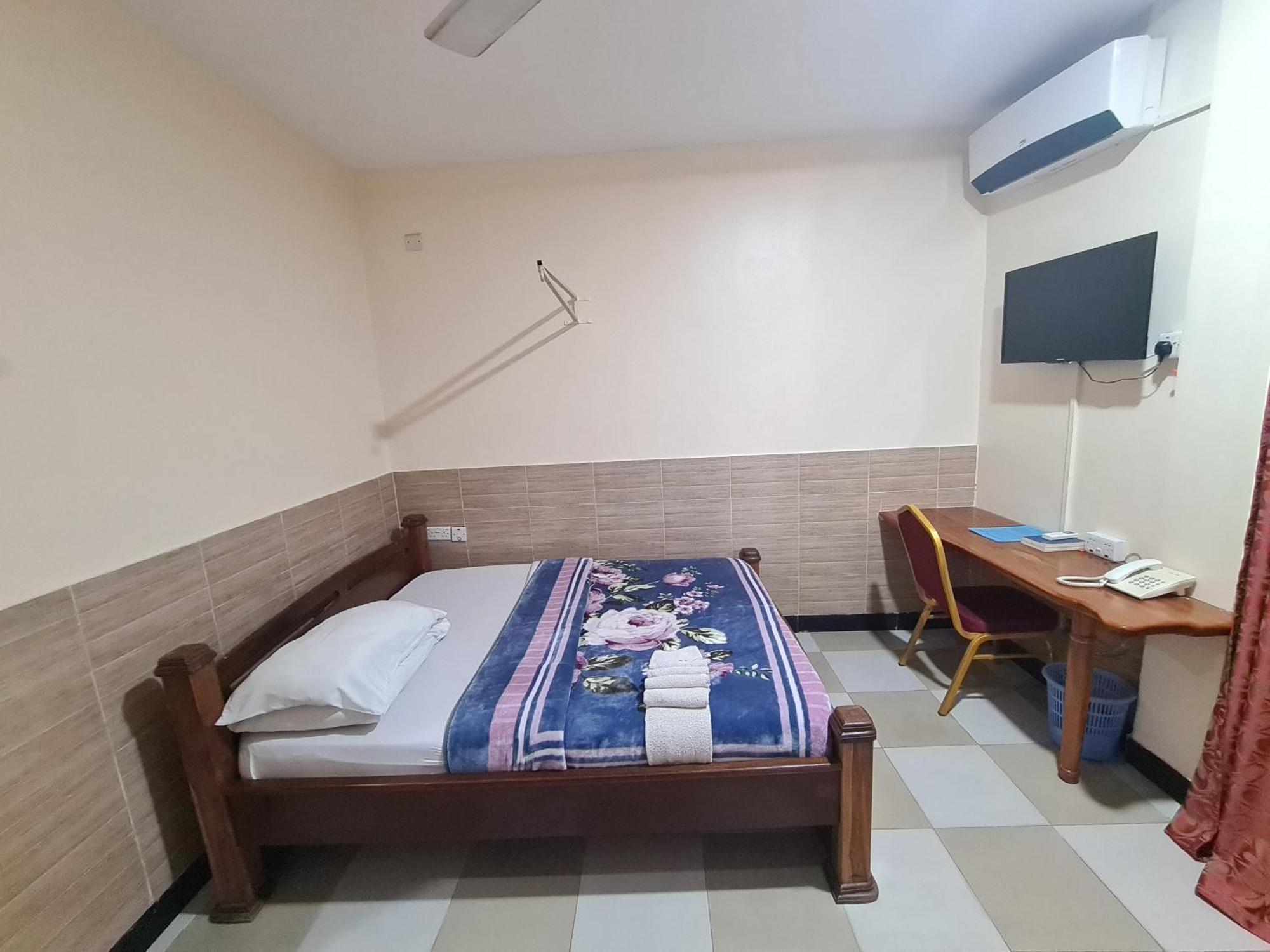 Dolphin Hotel Танга Екстериор снимка