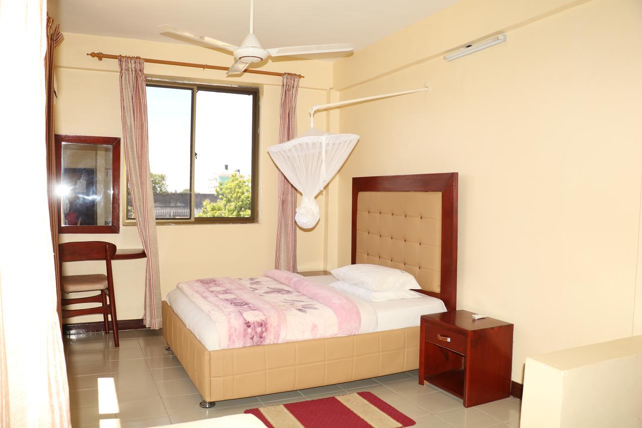 Dolphin Hotel Танга Екстериор снимка